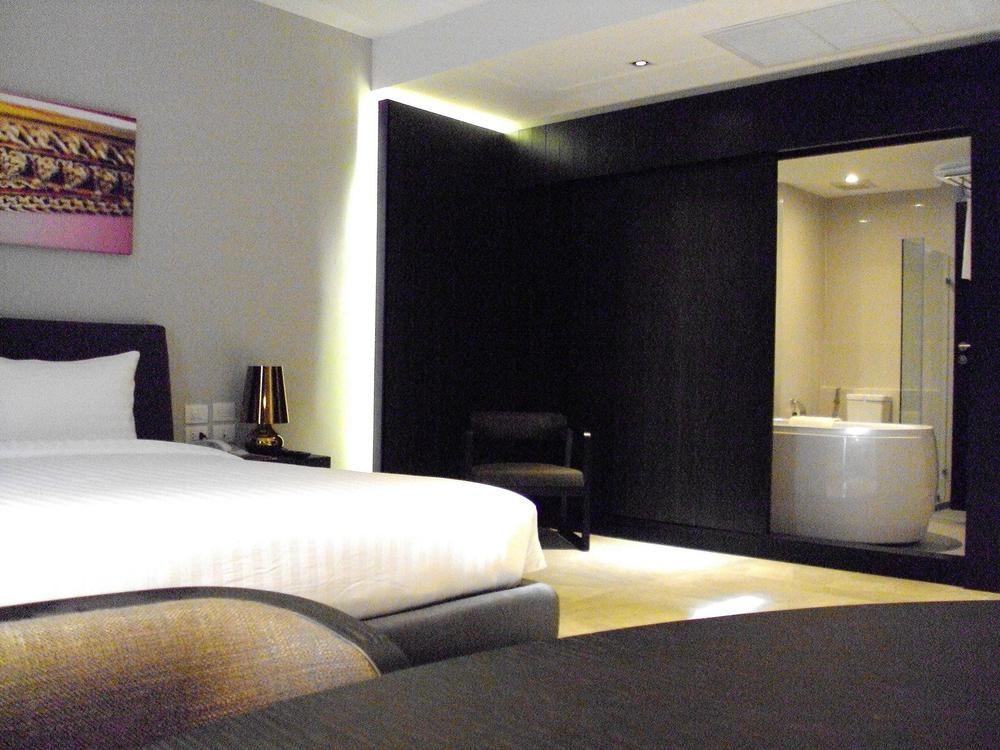 S Ratchada Leisure Hotel - Sha Plus Bangkok Exterior foto A room at the hotel