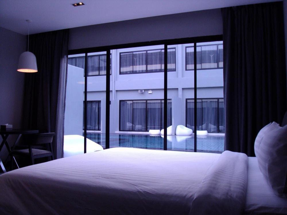 S Ratchada Leisure Hotel - Sha Plus Bangkok Exterior foto A bedroom at the hotel