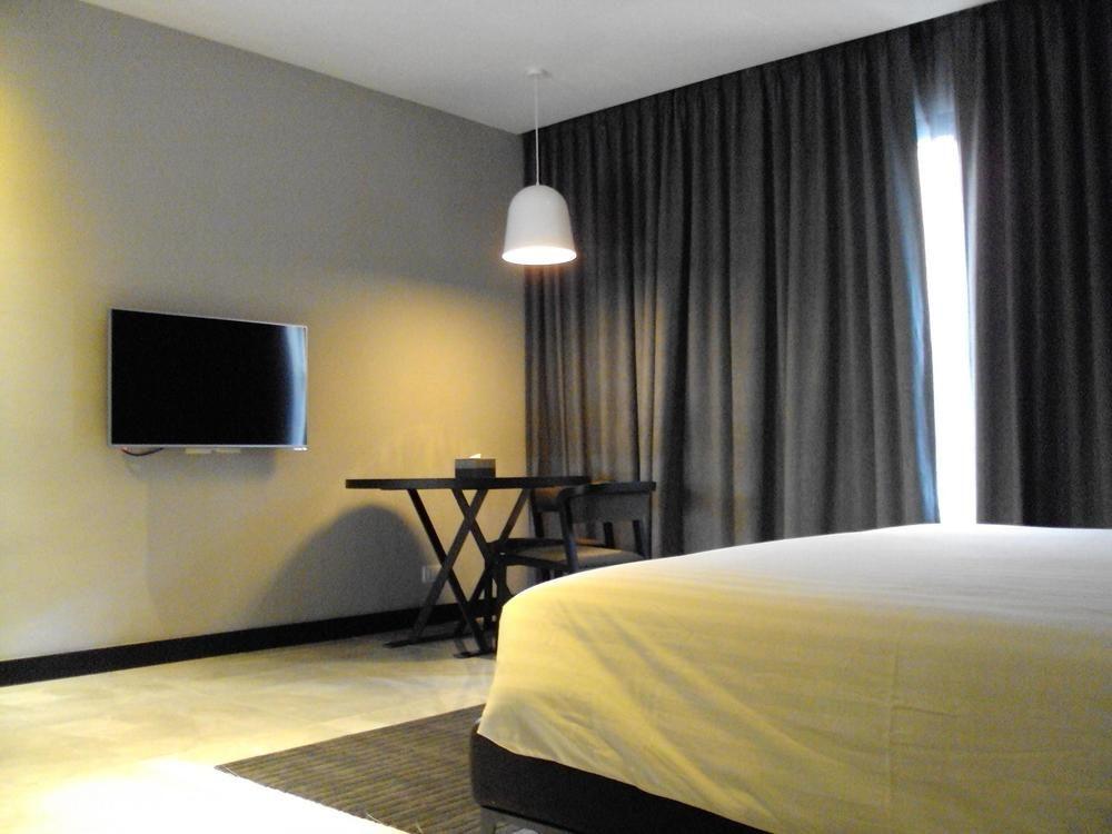 S Ratchada Leisure Hotel - Sha Plus Bangkok Exterior foto A room at the hotel